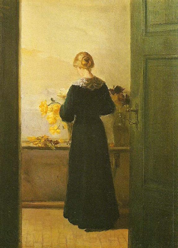 Anna Ancher en ung pige ordner blomster Spain oil painting art